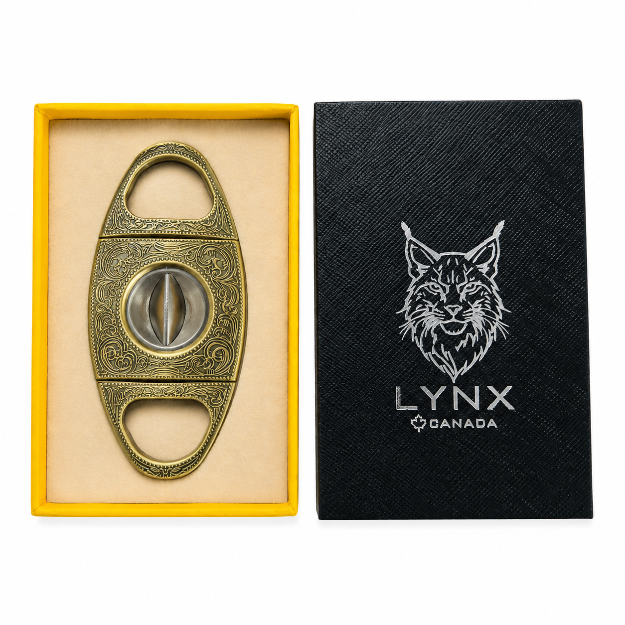 Cigar cutter in a yellow box with a black cover featuring a lynx logo.