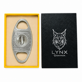 Cigar cutter in a yellow box with a black card featuring a lynx logo on a white background
